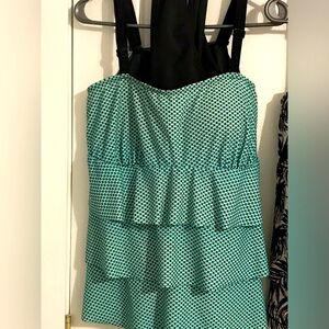 Women’s plus size swim suit. 2 piece, layered front, very flattering.